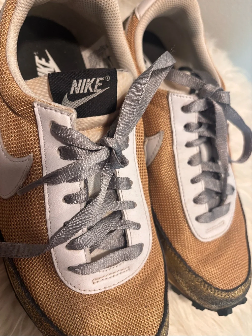Nike Women’s Metallic Gold Mesh Sneakers